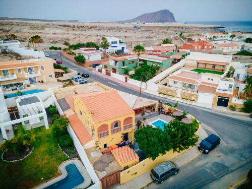 an aerial view of a small town with buildings at Hostel Los Amigos by Youroom in La Mareta