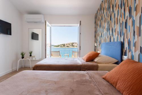 Villa Sea Touch - beachfront, with a heated pool