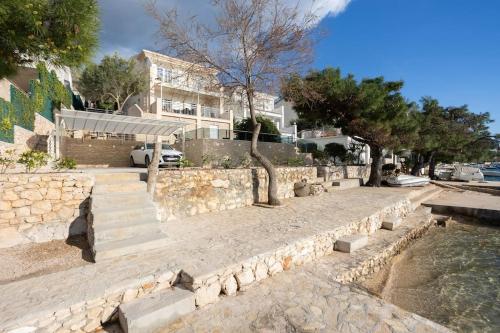 Villa Sea Touch - beachfront, with a heated pool