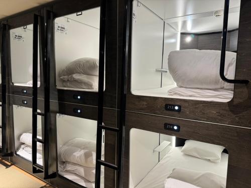 Koupelna v ubytování Capsule Hotel Suzumoriya