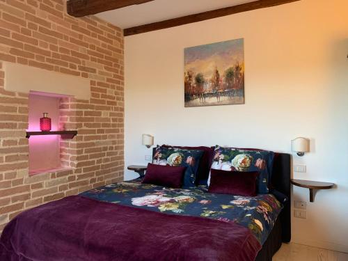 Cama o camas de una habitación en Gastronomic B&B CarloCarla