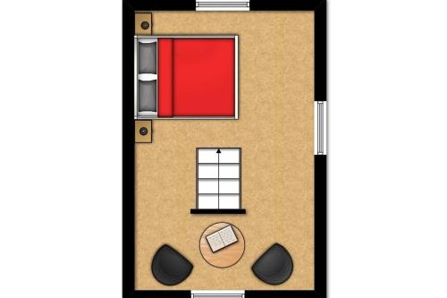 a floor plan of a small house with a red door at Ferienwohnung Johanna OG in Wohlenberg