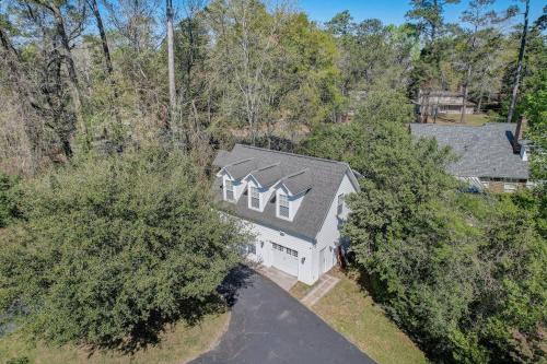 an overhead view of a white house with a gray roof at Creole Dame Bed & Breakfast Inn in Sumter