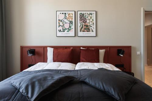 Postel nebo postele na pokoji v ubytování Centra Nams - Center Apartments