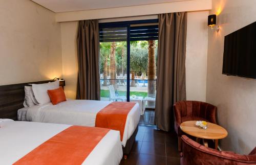 Letto o letti in una camera di Wazo Hotel
