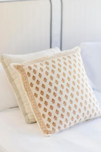 two pillows sitting on top of a bed at Soho Boutique Las Vegas in Málaga