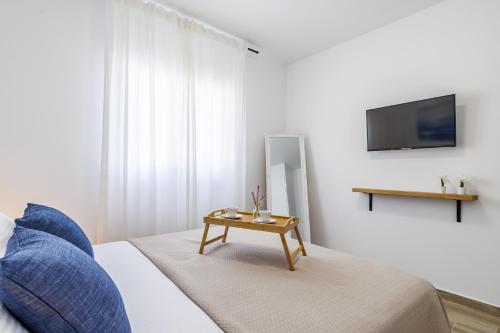 TV a/nebo společenská místnost v ubytování Camellia Home