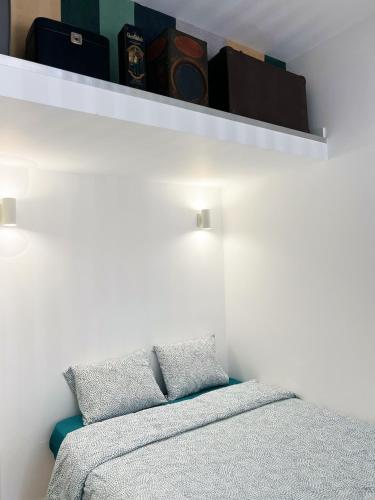 Katil atau katil-katil dalam bilik di Seaside Studio - Peniche