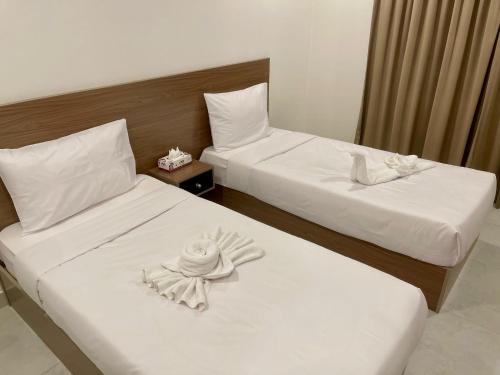 Łóżko lub łóżka w pokoju w obiekcie برج ماجيك سويت Magic Suite Tower