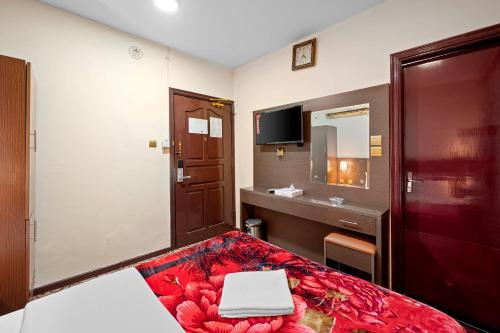 TV a/nebo společenská místnost v ubytování Najiba Hotel