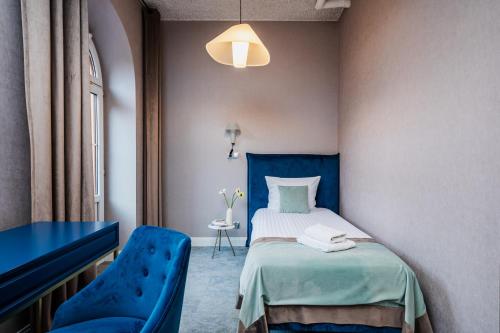 Кровать или кровати в номере Focus Premium Apartments by Focus Hotels