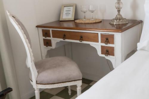 Postel nebo postele na pokoji v ubytování Villa Vicuña Salta Hotel Boutique