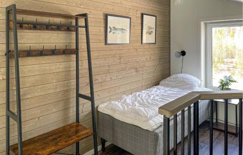 a bedroom with two bunk beds in a room at 3 Bedroom Lovely Home In Säffle in Säffle