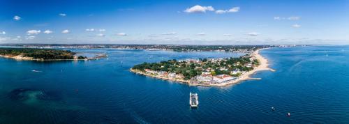 an aerial view of an island in the water at Holiday home with Panoramic Sea Views in Lytchett Minster