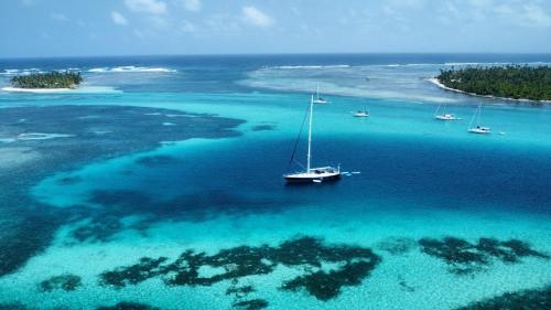 an aerial view of a sail boat in the ocean at 73ft Family Sailing Yacht with Crew - all inclusive in Waisalatupo