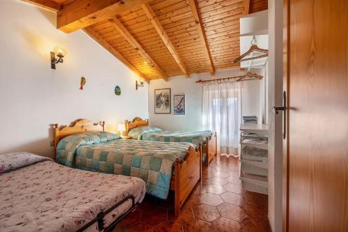 Postel nebo postele na pokoji v ubytování Casa Adele