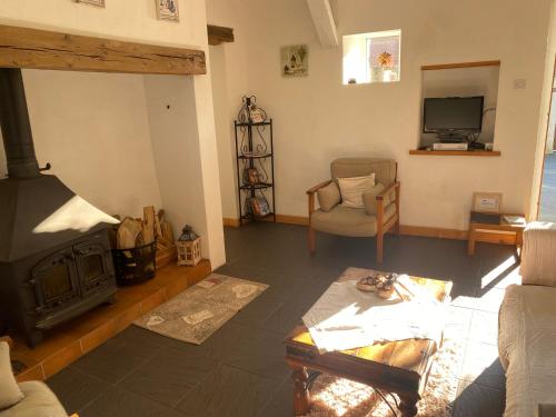 Χώρος καθιστικού στο LE COTTAGE 72 - Les contensières