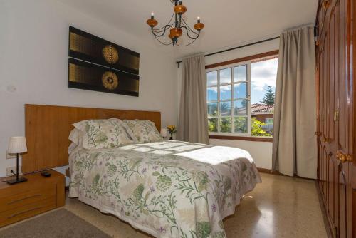 Postel nebo postele na pokoji v ubytování Villa Los Almendros