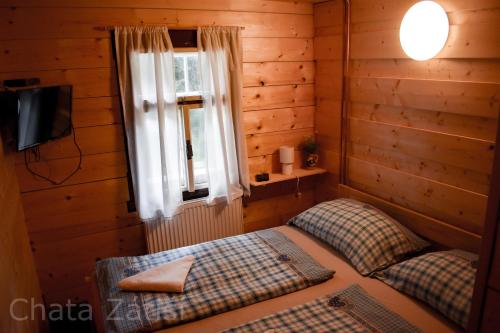 Postel nebo postele na pokoji v ubytování Penzion chalupa zátiší