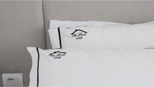 Postel nebo postele na pokoji v ubytování Home DeLuis