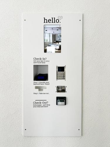 a poster for a hello refrigerator with pictures of appliances at Hood House Kassel - volldigitales Serviced Apartment in Kassel