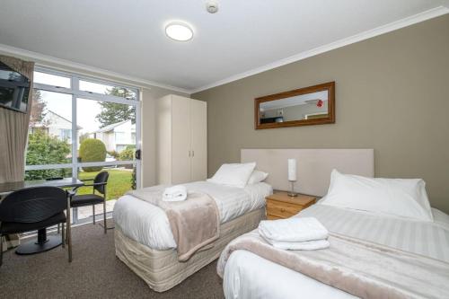 Postel nebo postele na pokoji v ubytování Methven Nest Apartment