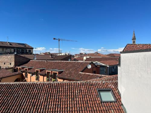 a view of roofs of a city with buildings at Casa GIULIVA in Alessandria