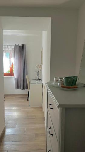 Kuchyň nebo kuchyňský kout v ubytování B&B CASA GARGIULO
