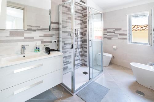 Et badeværelse på Casa Di Gregorio - Intero Appartamento