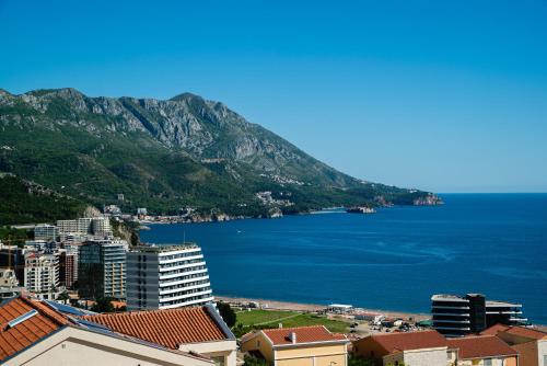 a view of a city and a body of water at The Dream Getaway & Spa by DeVasco in Becici