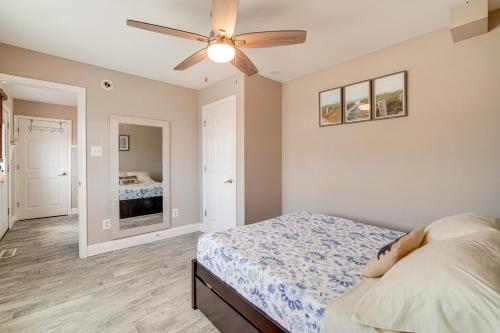 a bedroom with a bed and a ceiling fan at Walkable Brigantine Condo, 4 Mi to Atlantic City! in Brigantine
