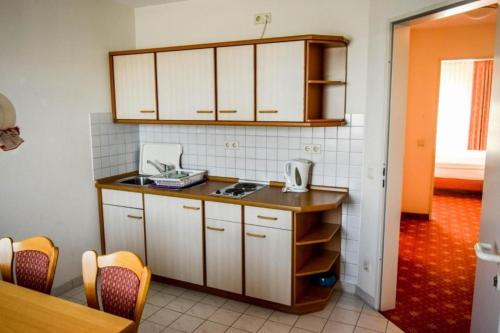 Ferienwohnung 4 Personen 6 tesisinde mutfak veya mini mutfak
