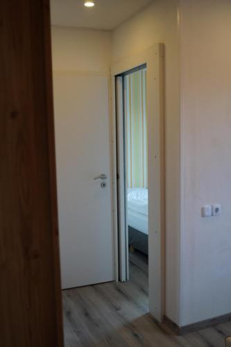 Ένα ή περισσότερα κρεβάτια σε δωμάτιο στο Hotel Pension De Gasterei