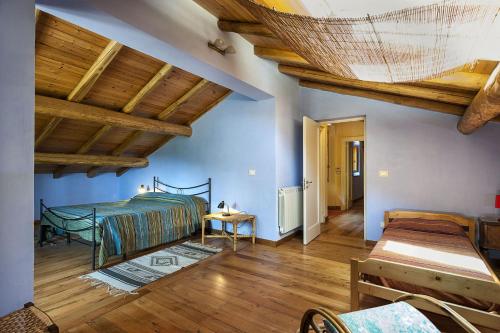 Ένα ή περισσότερα κρεβάτια σε δωμάτιο στο Casa Rosa