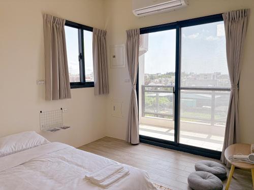 Postel nebo postele na pokoji v ubytování Lunos homestay