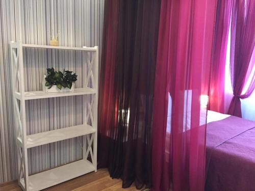 Postel nebo postele na pokoji v ubytování Light Apartments