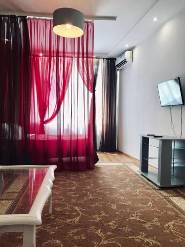 TV a/nebo společenská místnost v ubytování Light Apartments