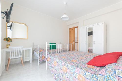 Postel nebo postele na pokoji v ubytování Casa Gita a Tindari