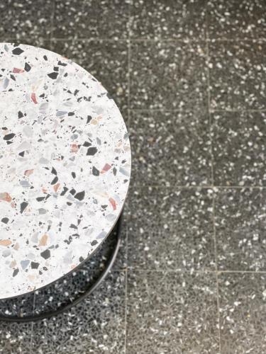 a plate sitting on top of a tiled floor at The Luxe by Maiden Art in Arona
