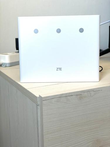 a white appliance sitting on top of a table at The Luxe by Maiden Art in Arona