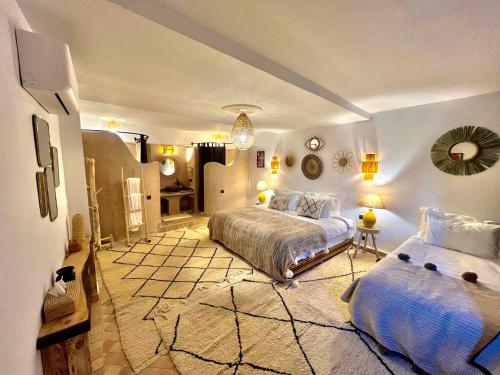 Krevet ili kreveti u jedinici u okviru objekta Riad Sahara Stars Dades