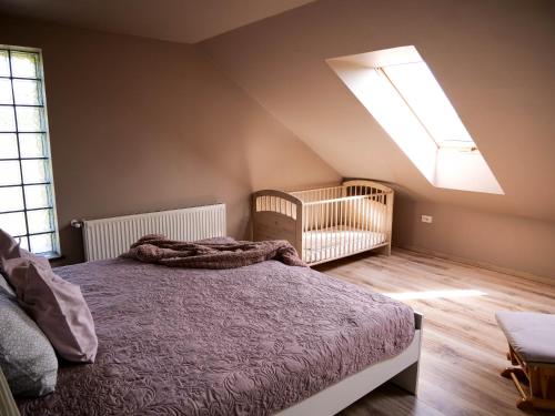 Postel nebo postele na pokoji v ubytování Pipacs Apartman