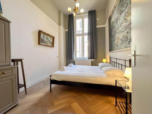 Un pat sau paturi într-o cameră la Weeshuis Groot
