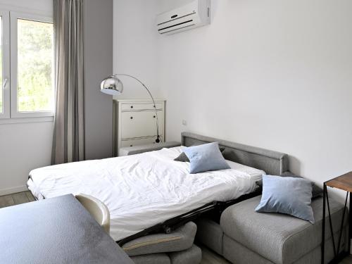Posteľ alebo postele v izbe v ubytovaní Boutique Apartment “Diviso Due”