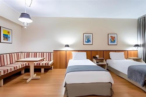 Krevet ili kreveti u jedinici u okviru objekta Hotel Pan Americano