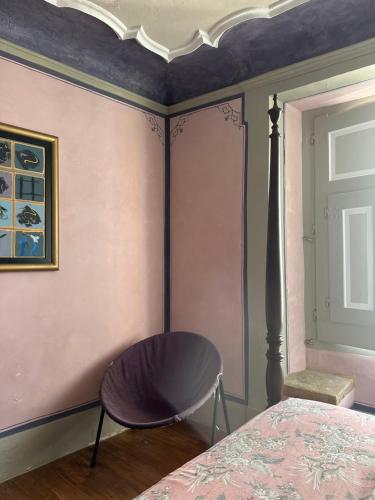 Ένα ή περισσότερα κρεβάτια σε δωμάτιο στο Casa dos Bijos