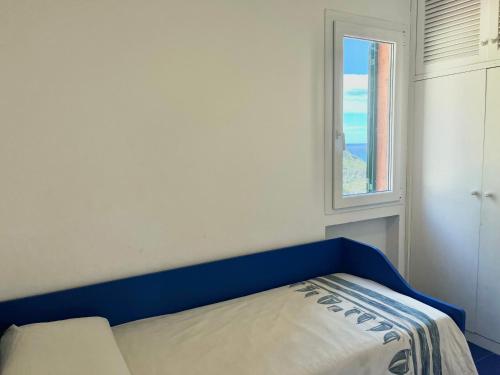 Ένα ή περισσότερα κρεβάτια σε δωμάτιο στο cala piccola peace of mind plus reserved beach