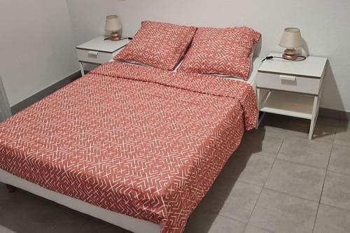 Postel nebo postele na pokoji v ubytování Appartement cosy de 2 chambres