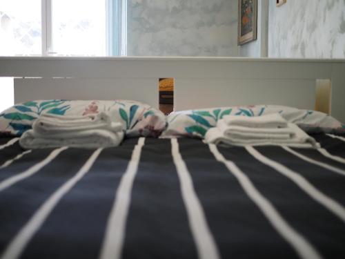 Postel nebo postele na pokoji v ubytování Francesca Apartments Ostia