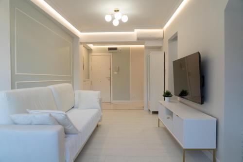 Televisyen dan/atau pusat hiburan di Apartamento mar&menta